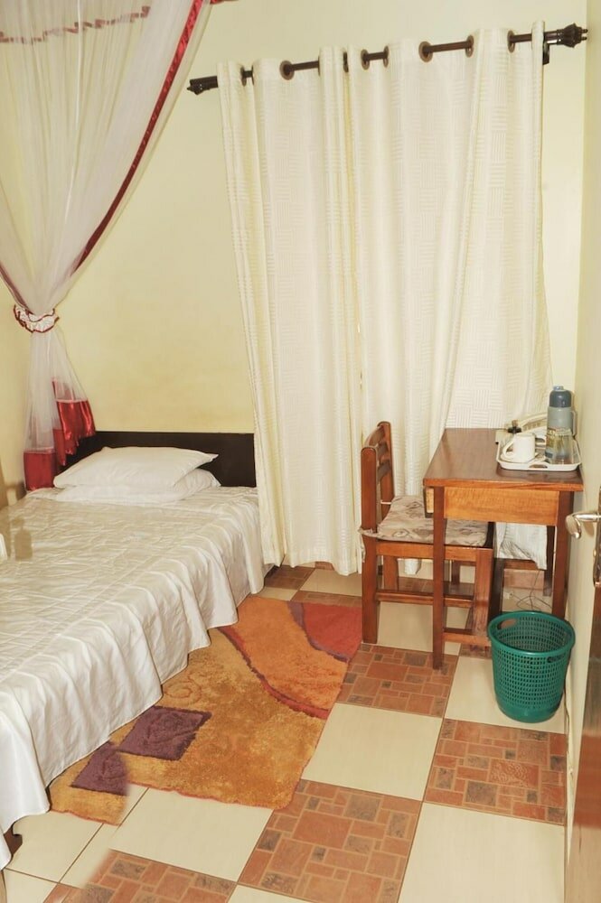 Фото New Scroll Inn Hotel