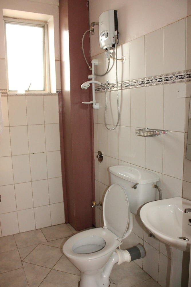 Фото New Scroll Inn Hotel