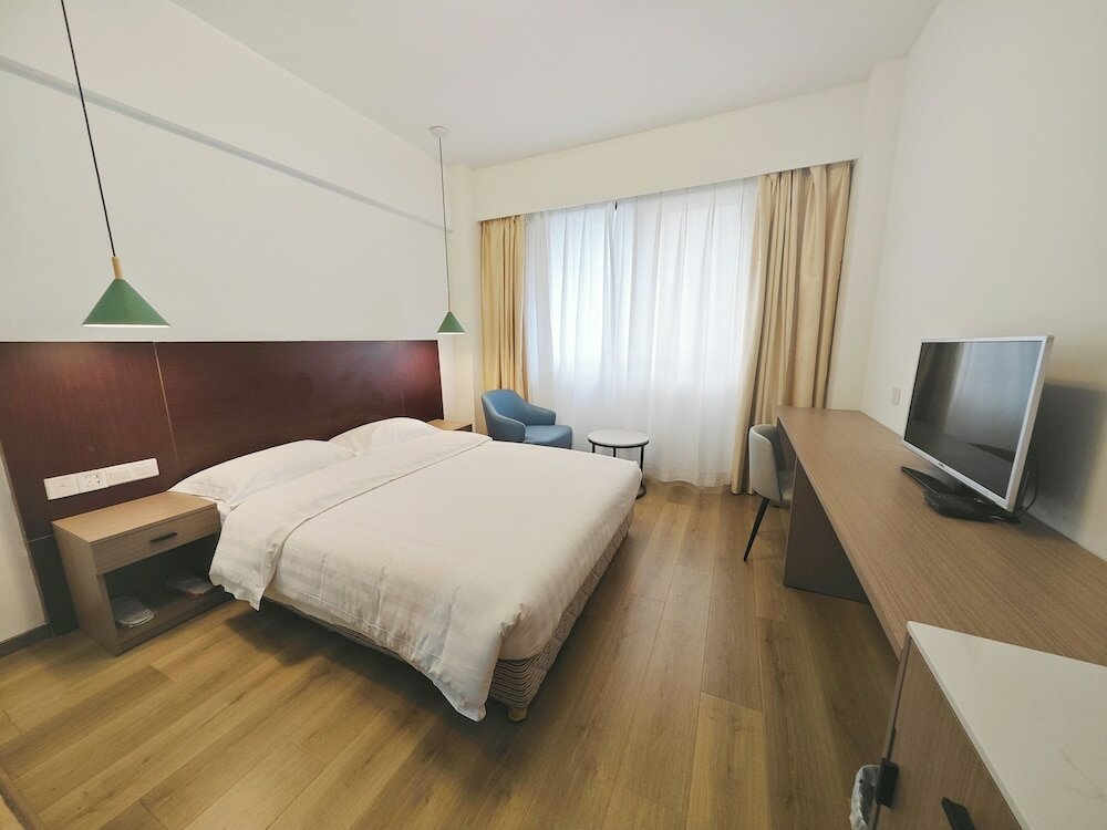 Фото Xinghua Hotel