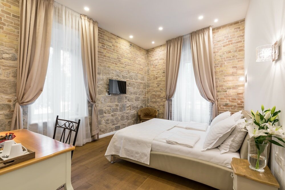 Фото Pellegrini Luxury Rooms