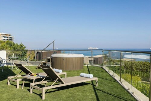 Внешний вид отеля Atlantica Bay в Агийосе Тихонасе, фото 5