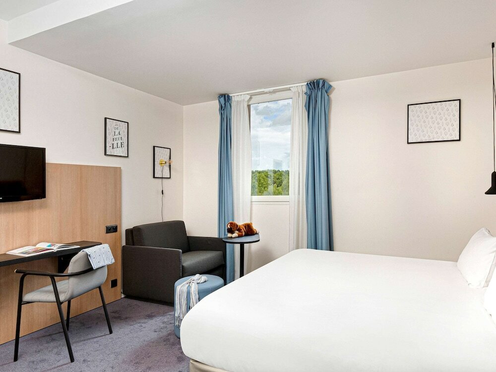 Фото ibis Styles Montargis Arboria