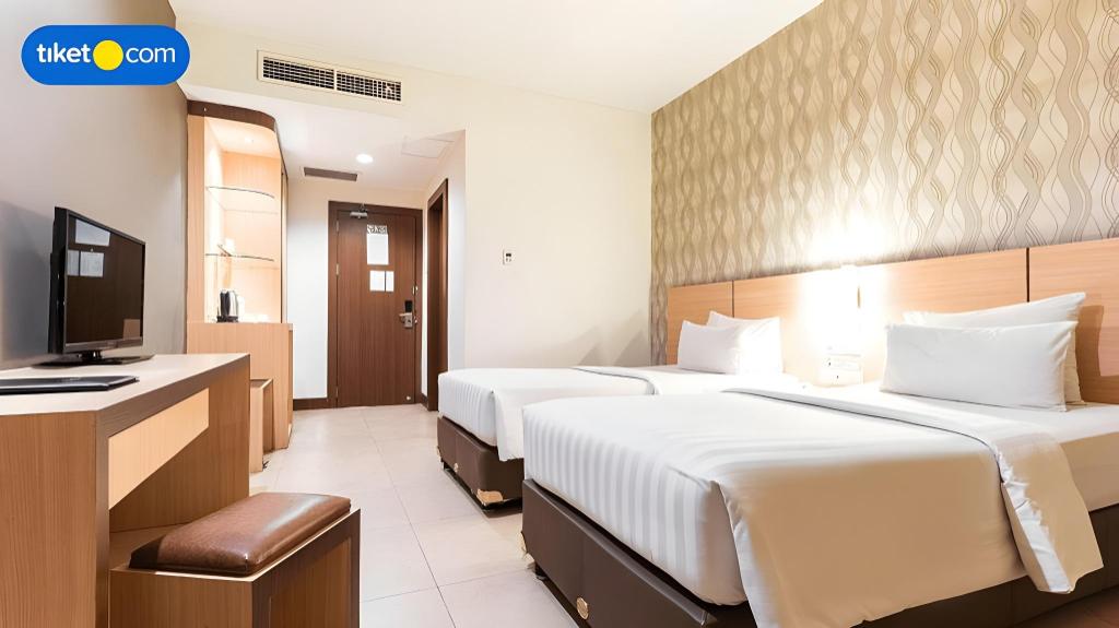 Фото Grand Impression Hotel Medan