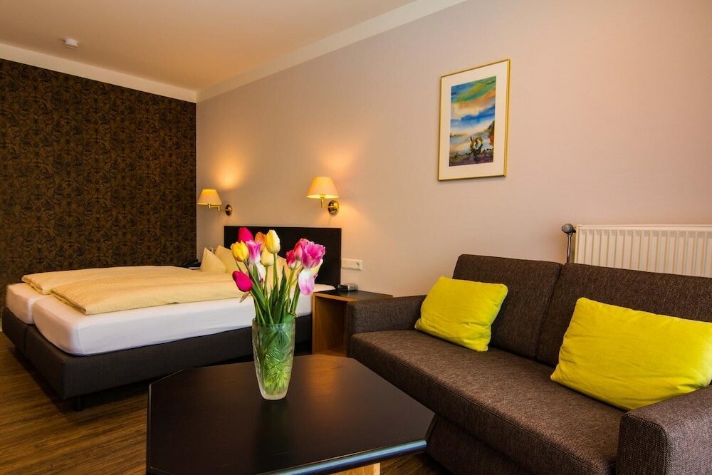 Фото Garni Hotel & Ferienwohnungen Seeschlößchen