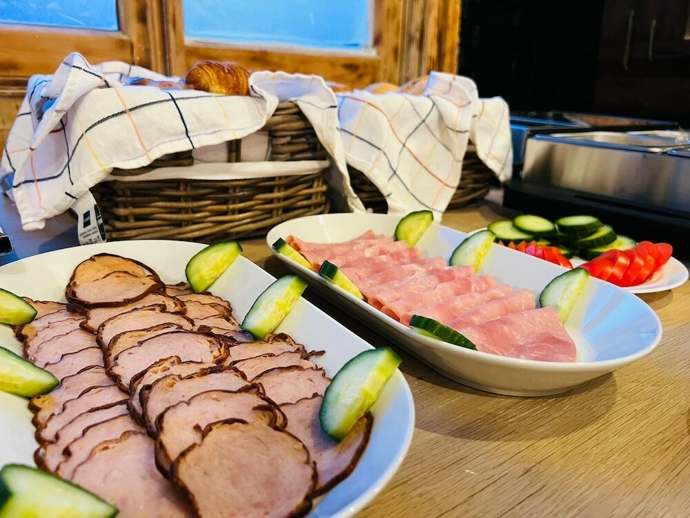 Фото Amsterdam Inn Hotel