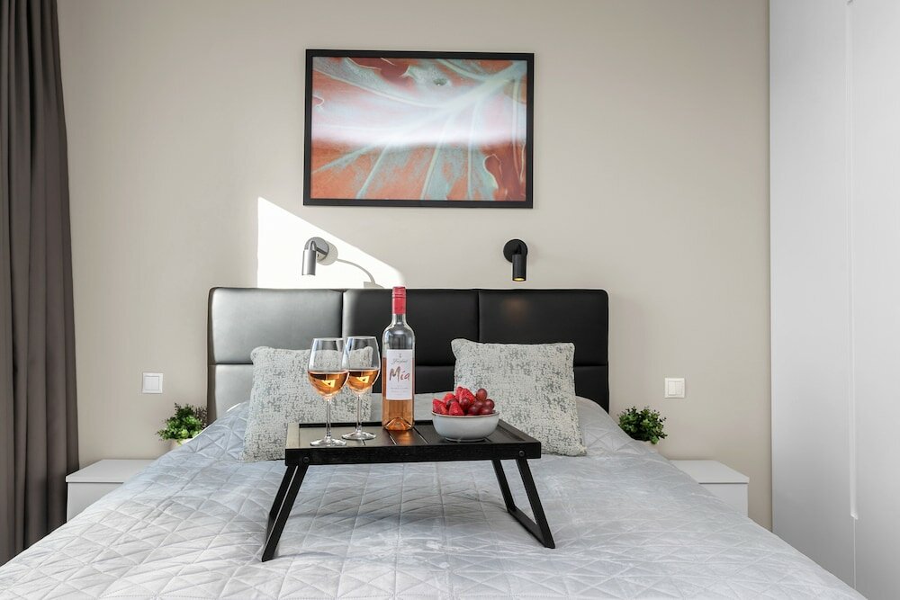 Фото Bella Apartments & Rooms