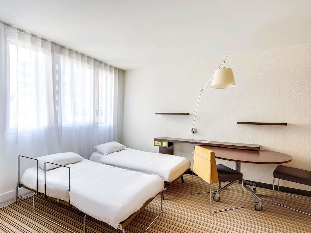 Фото Novotel Suites Paris Nord 18ème Hotel