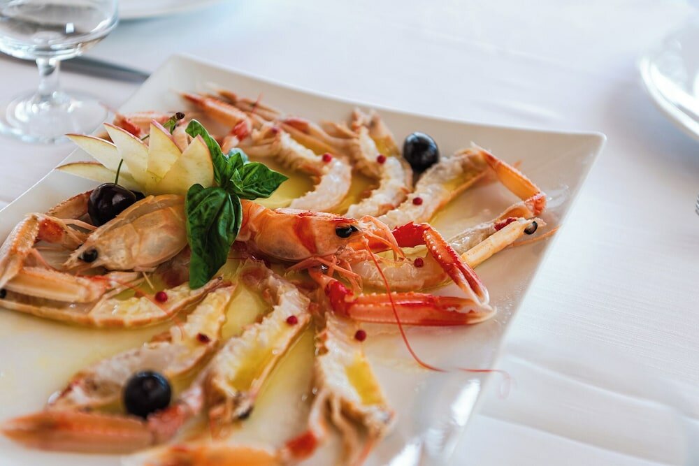 Фото Aragosta Hotel & Restaurant