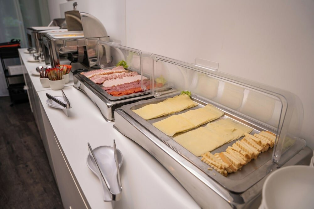 Фото Escala Hotel & Suites