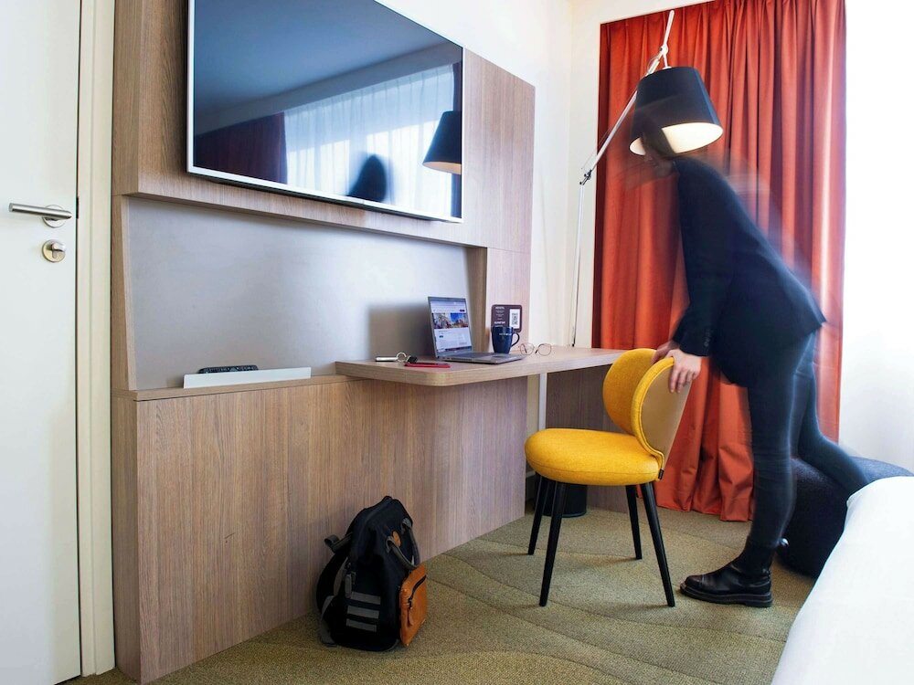 Фото Novotel Lyon Centre Confluence Bord de Saone