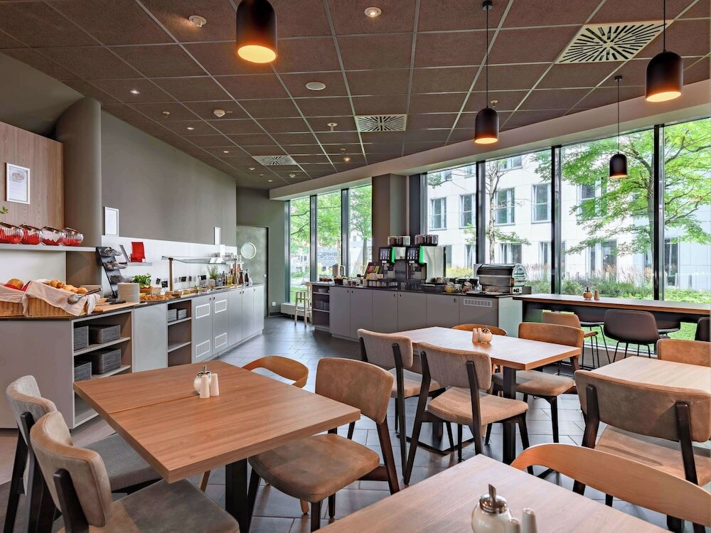 Фото Novotel Suites München Parkstadt Schwabing