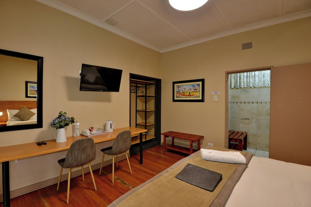 Фото Sunrock Guesthouse