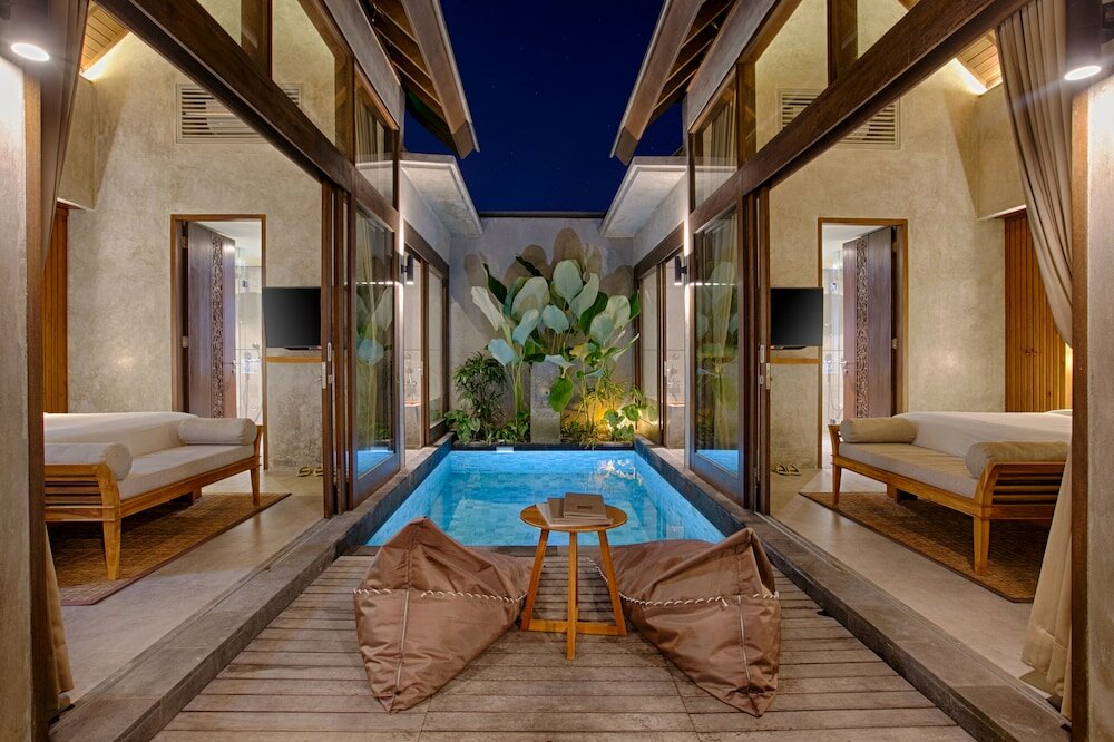 Фото Taman Dharmawangsa Suites