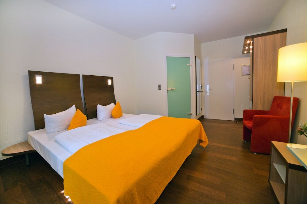 Фото Stadthotel Freiburg