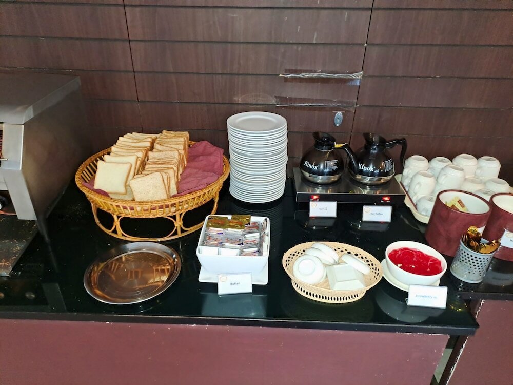 Фото Boss Suites Nana Hotel