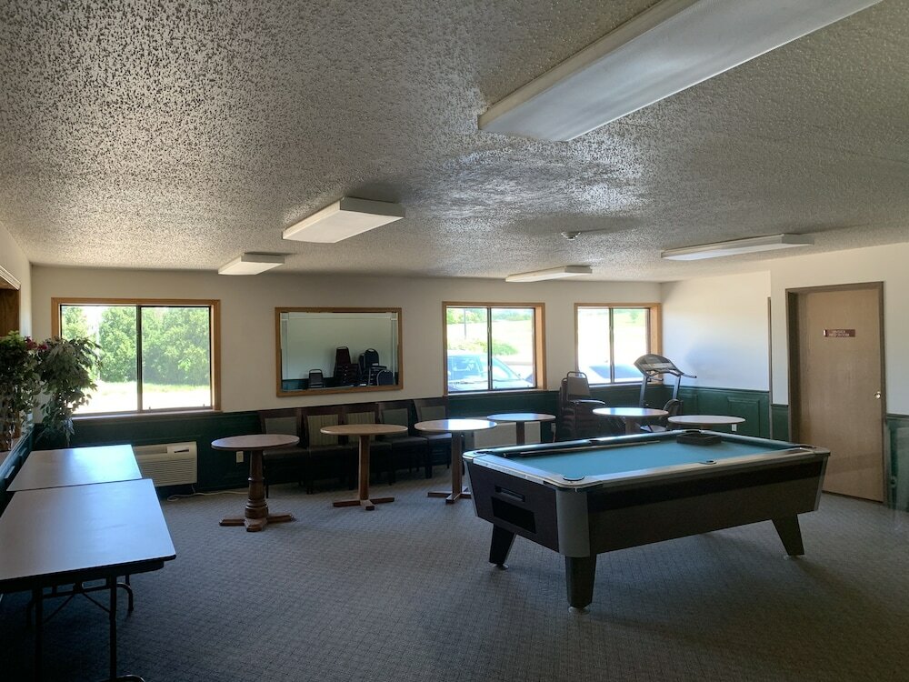 Фото Designer Inn & Suites