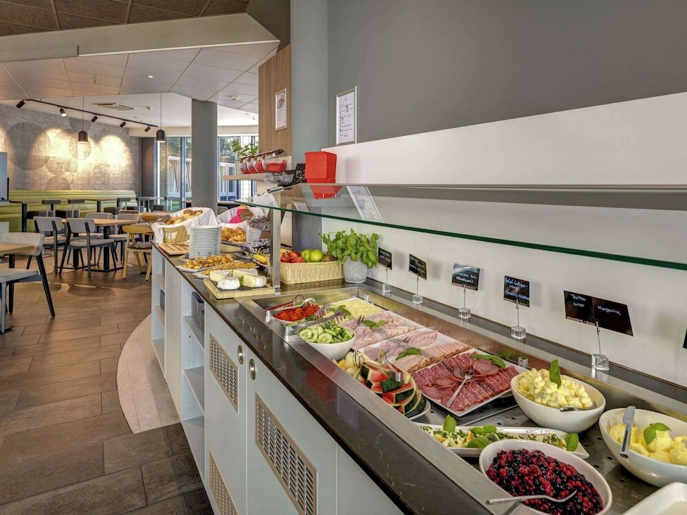 Фото Novotel Suites München Parkstadt Schwabing