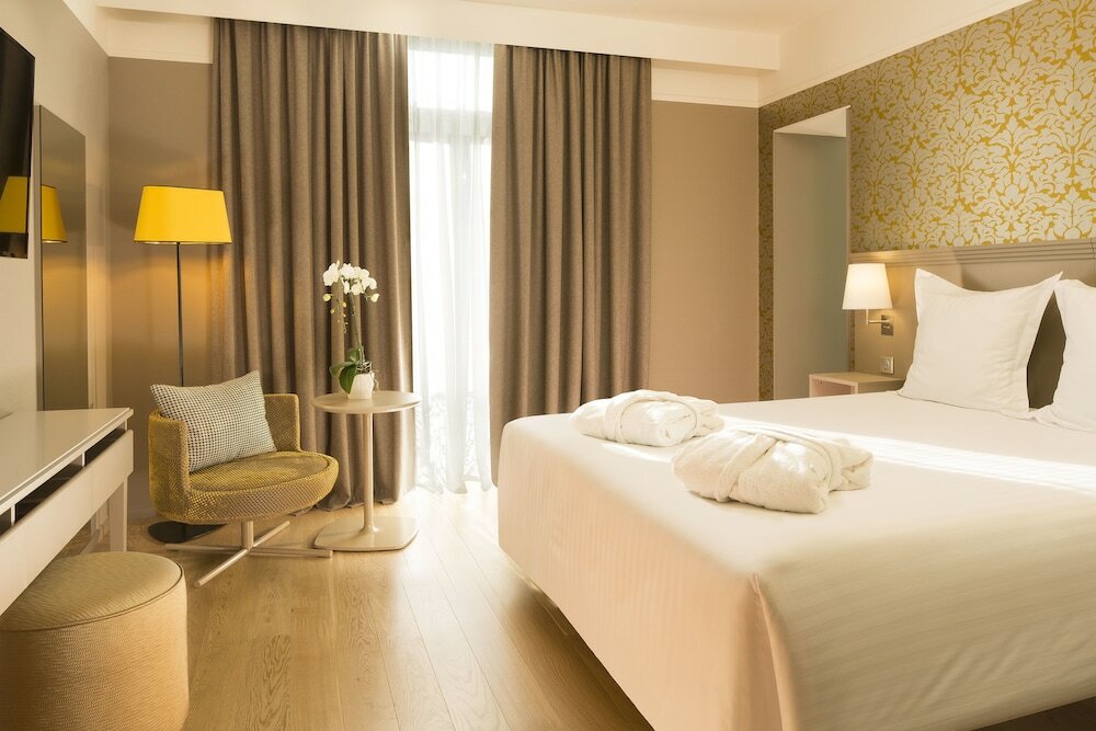 Фото Hôtel Oceania Le Jura Dijon