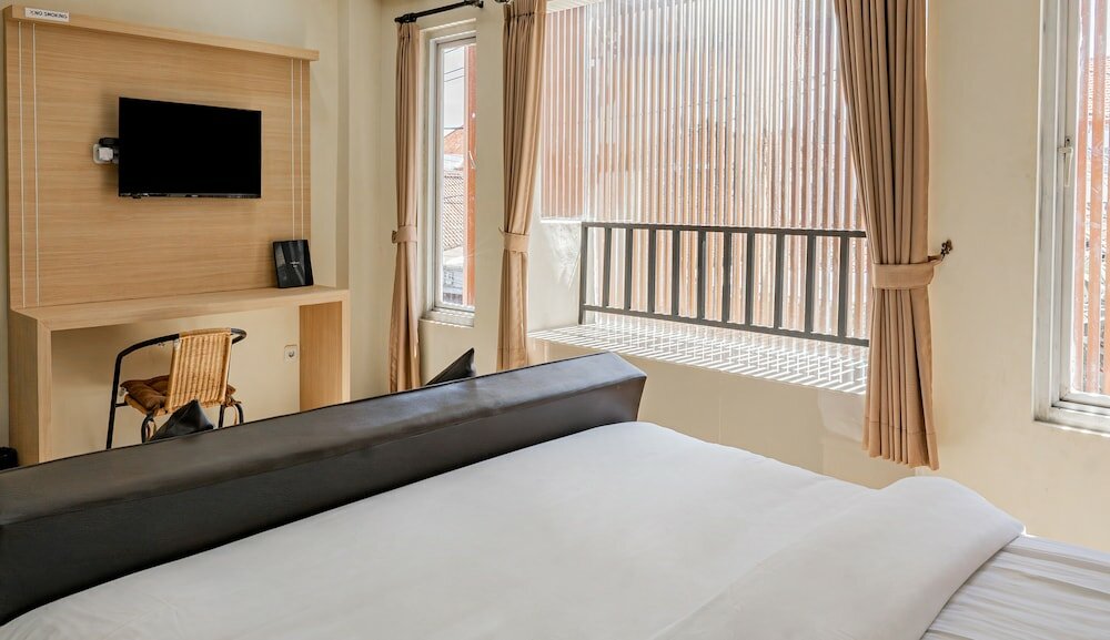 Фото Kuta Airport Insta Hotel