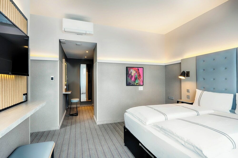 Фото Acom-Hotel Munich