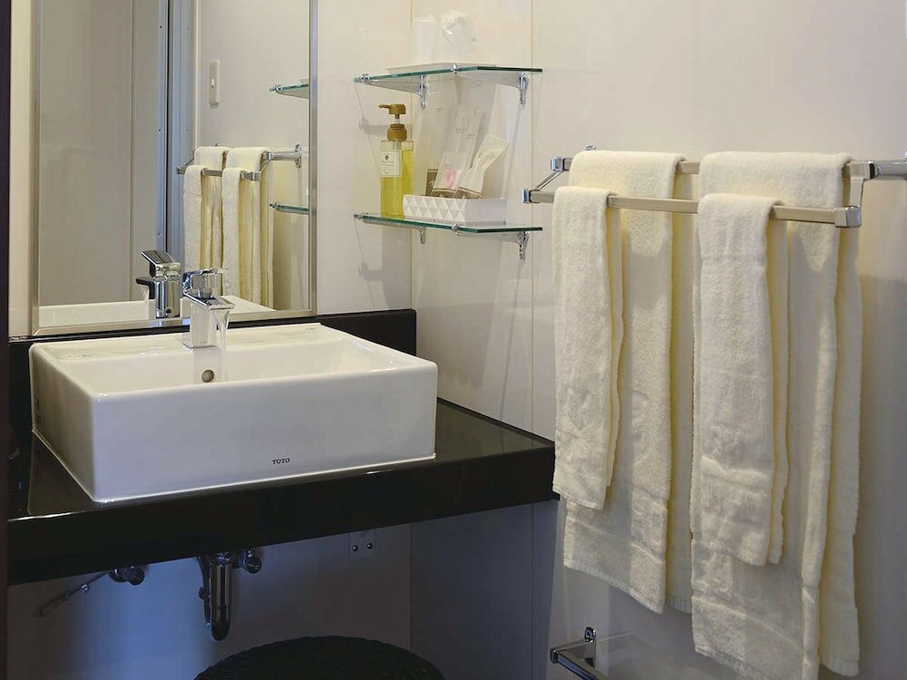 Фото Natural Hot Spring Midosuji Hotel