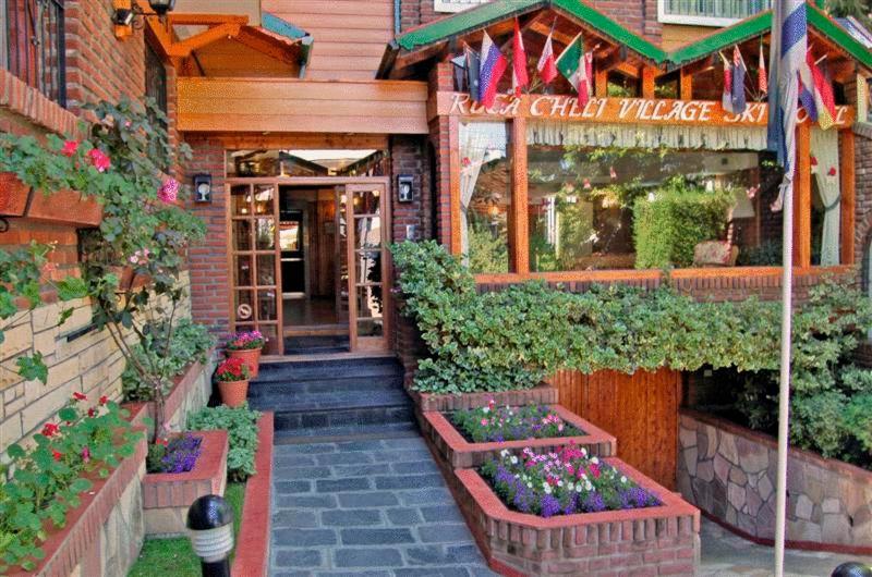 Фото Ruca Cheli Village Ski Hotel