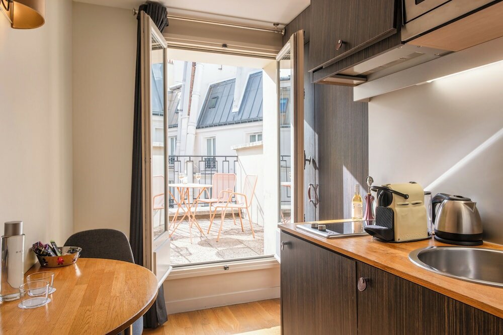 Фото Suites and Hotel Helzear Champs Elysees