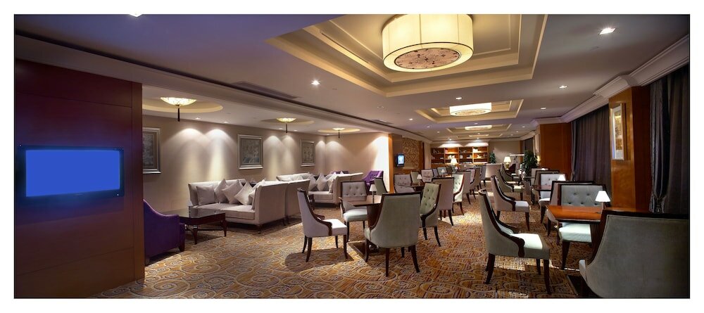 Фото Grand New Century Hotel Ninghai Jinhai