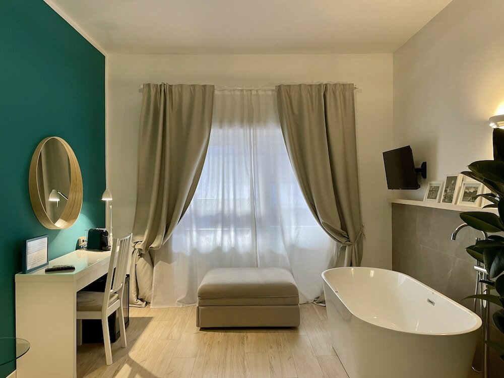 Фото Le Coq Rooms&Suite