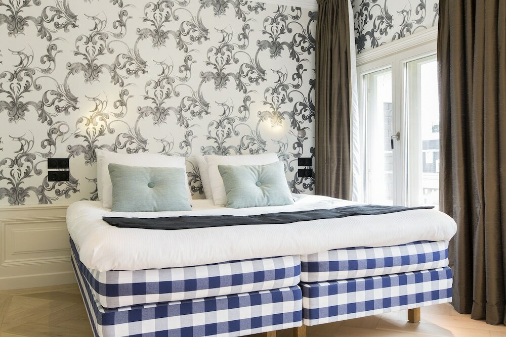 Фото The Amsterdam Canal Hotel