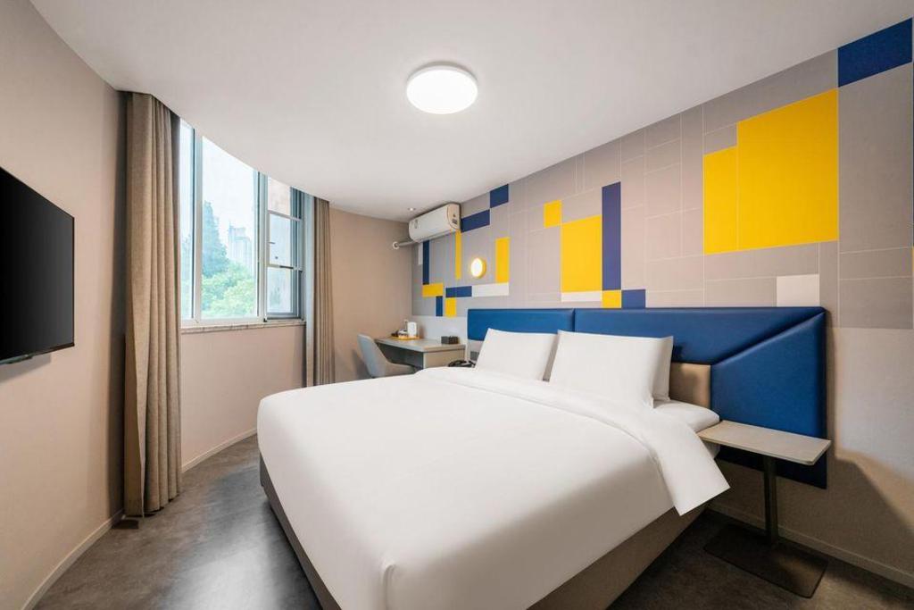 Фото 7Days Inn Shanghai LuJiaZui ShiMao Riviera GaRoaden