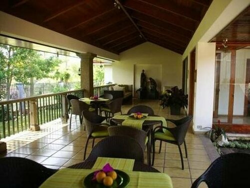 Гостиница Terrazas de Golf Boutique Hotel в Эредии