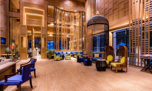 Гостиница Outrigger Surin Beach Resort на пляже Сурин