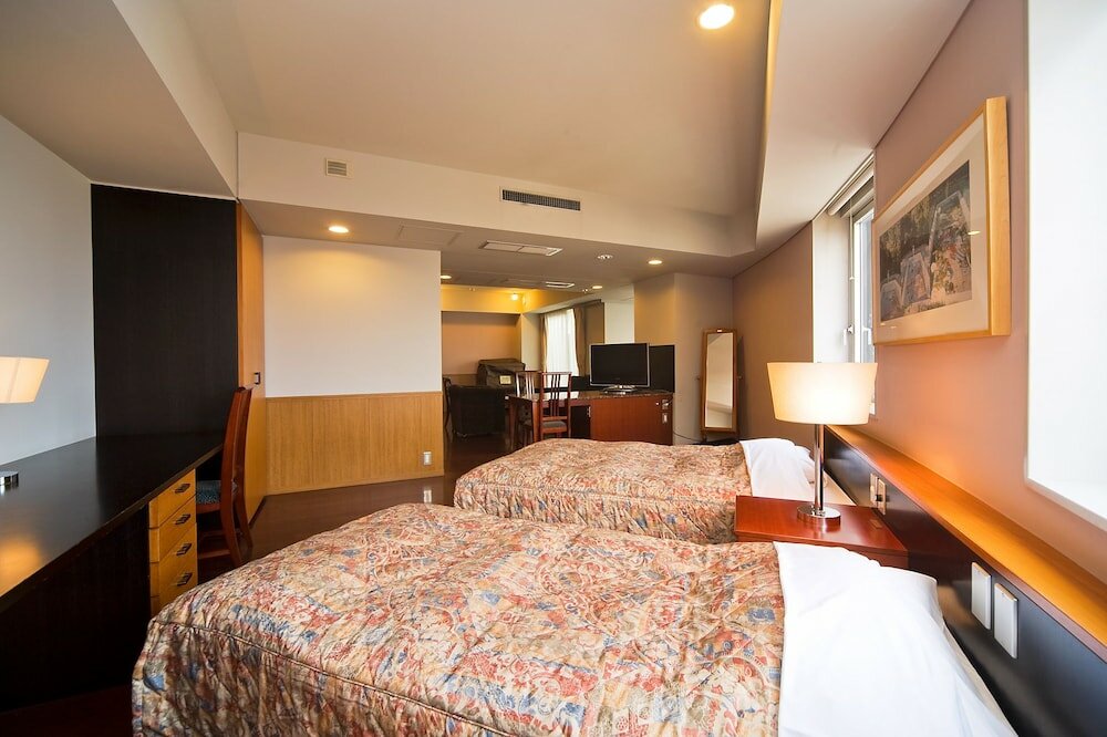 Фото The Residential Suites Fukuoka