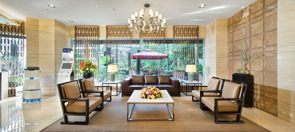 Фото Shenzhen New World Metro Grand Hotel