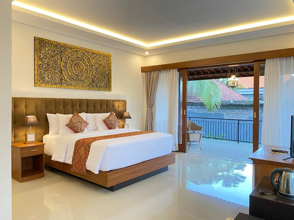 Фото Putri Ayu Cottages