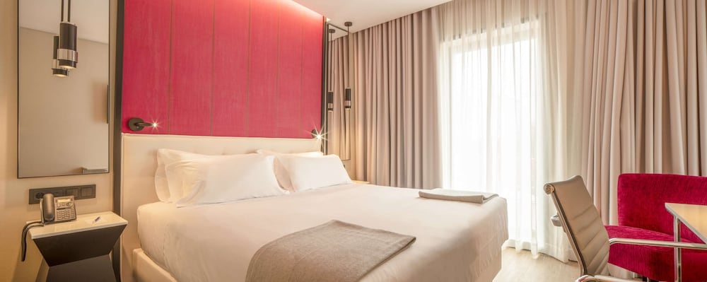 Фото Nh Hotel Porto Jardim