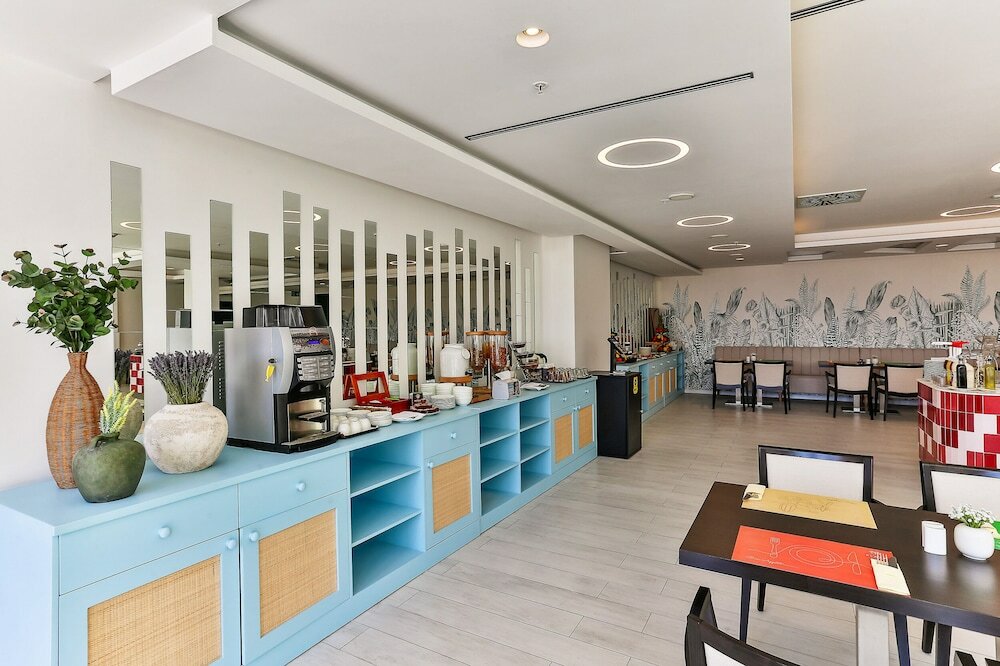 Фото Hotel Tq Plaza