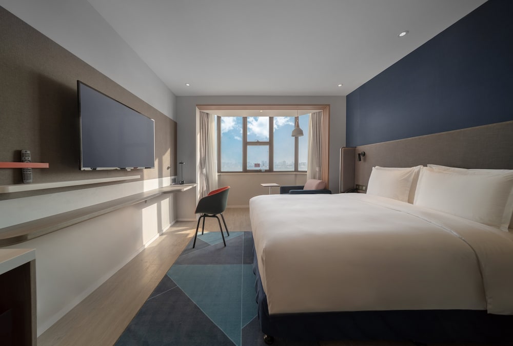 Фото Holiday Inn Express Shanghai Jinqiao Central, an Ihg Hotel