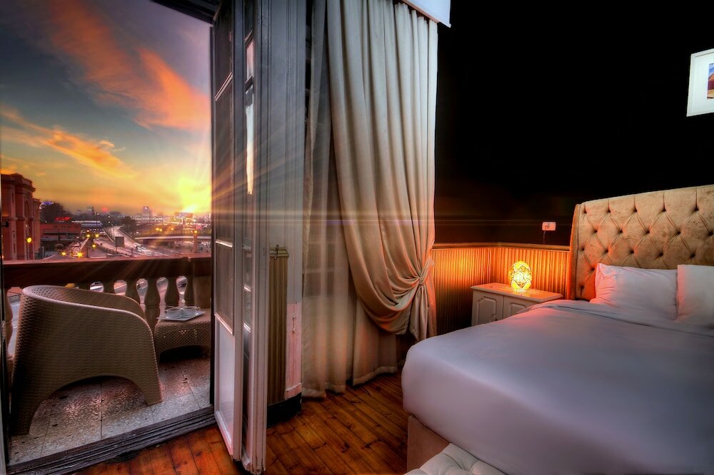 Фото Tahrir Plaza Suites