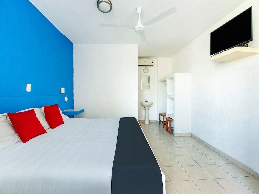 Фото Capital O Hotel El Mejicano