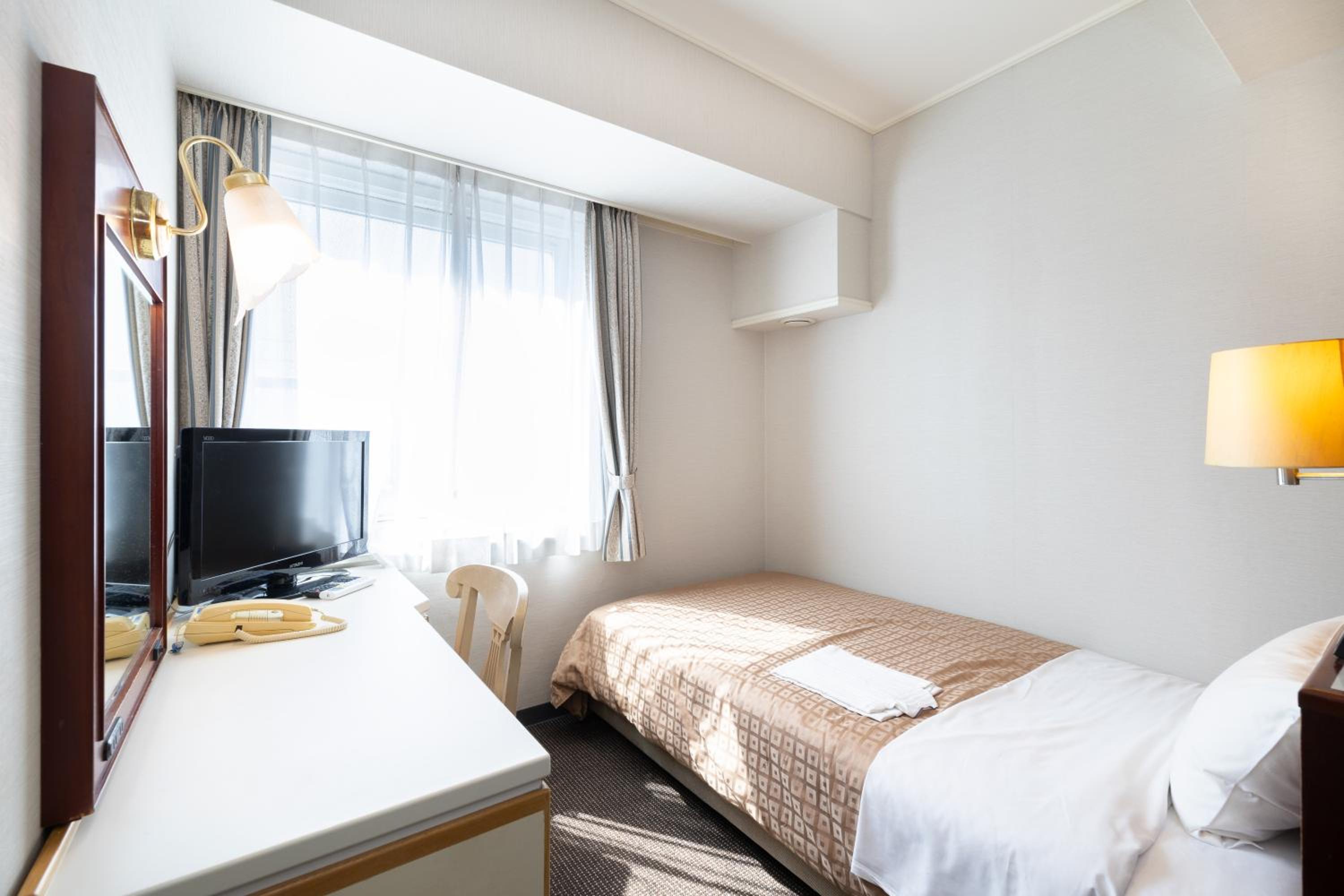 Фото Hiroshima Intelligent Hotel Annex