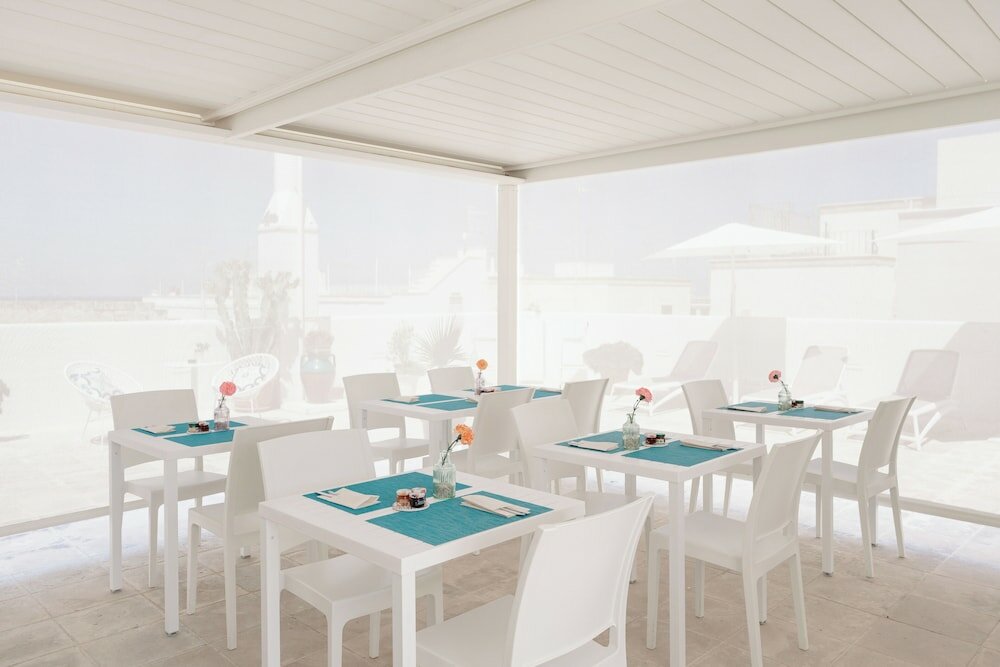 Фото Donna Domenica Boutique Suites