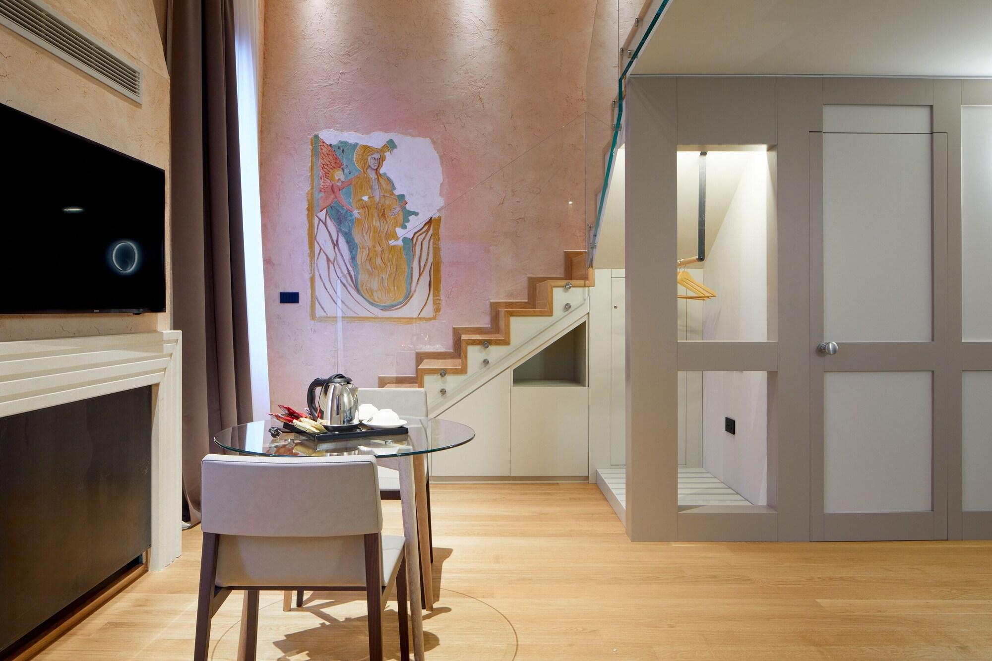 Фото Ca' dei Proverbi Suites