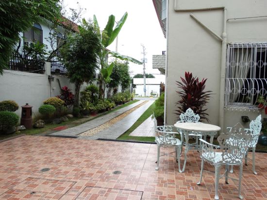 Фото Harbour Gardens Tourist Inn