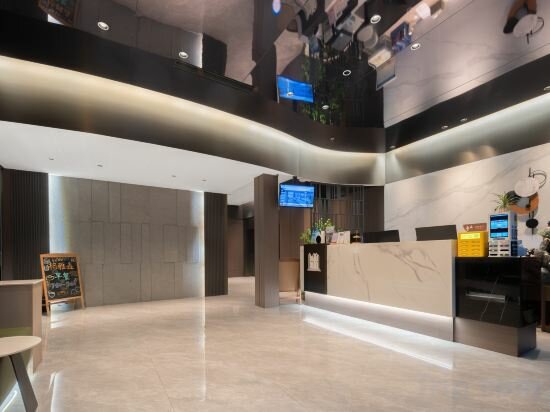 Фото GYA Xin Hotel (Xiamen Railway Station Lianban Mingfa Commercial Plaza)