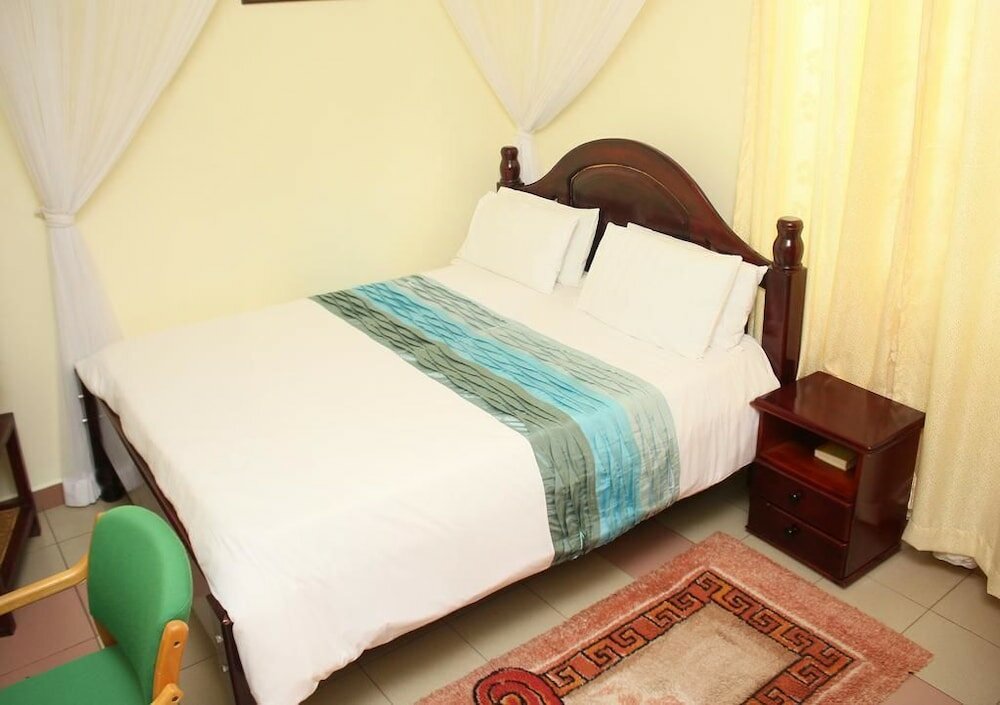 Фото New Scroll Inn Hotel