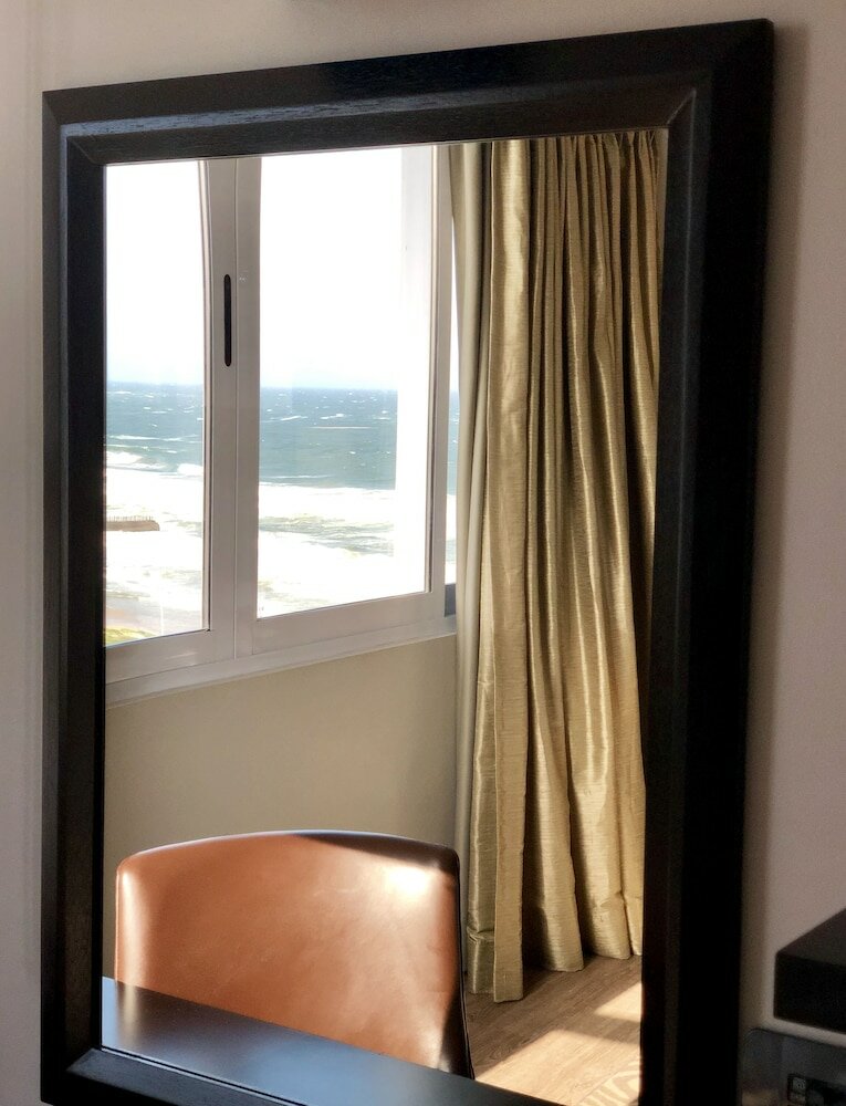 Фото Belaire Suites Hotel