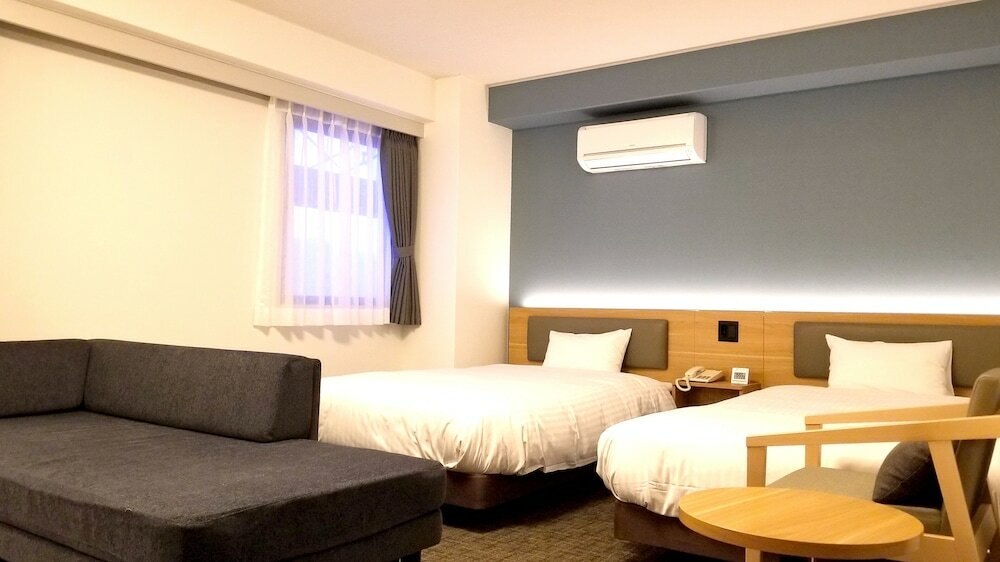 Фото Kochi Sunrise Hotel