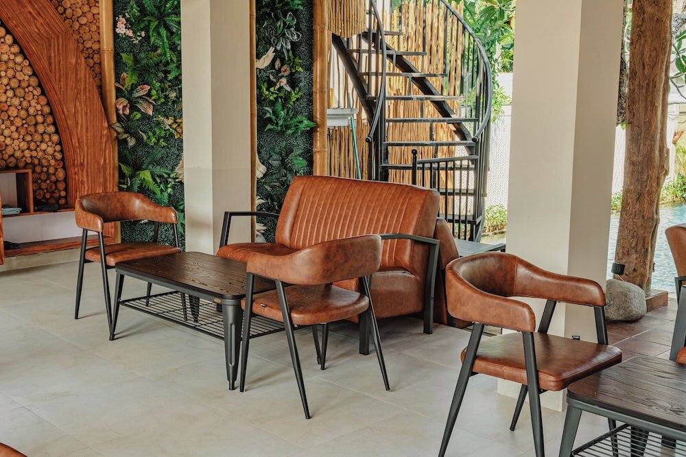 Фото Putri Ayu Cottages